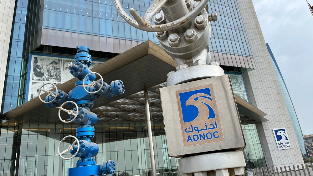 A picture shows the headquarters of UAE's state oil company ADNOC in Dubai on July 27, 2022. (Photo by Giuseppe CACACE / AFP)